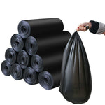 Roll of large black garbage bags, 30 x 50 inch, convenient for storage.