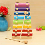 Child-safe wooden xylophone musical instrument, featuring a sturdy frame and colorful keys.