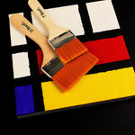 Close-up of the fine synthetic bristles on a flat paint brush, ideal for smooth acrylic painting.