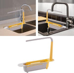 A telescopic sink organizer positioned under a running faucet, showcasing its drainage capability.