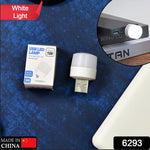 A white USB LED lamp and its small white packaging are displayed on a blue textured surface.