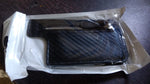 A person demonstrating how to easily attach the black adhesive phone card holder to a smartphone.