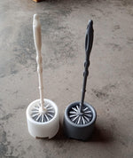 Side profile of the Pro Clean toilet cleaning brush and its compact potted holder.