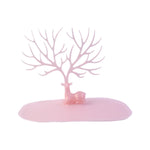 Top view of pink deer jewelry stand with branches for accessories, India
