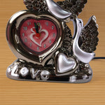 Romantic swan couple table lamp providing ambient bedroom lighting