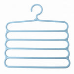 Multi layer plastic hanger on white background