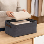 Foldable cloth storage organizer bag packed with clothes