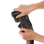 Black trash bag (17x19 inches) unfolded, ideal for small waste disposal.