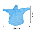 A woman models a blue plastic rain poncho from the front and back, standing on a paved road with trees.