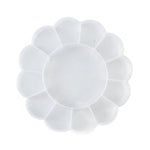 Top-down view of an empty, clear, flower-shaped plastic organizer box with 13 compartments on a white background.