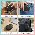 The open black oval hard shell case is empty, revealing a mesh pocket on one side and three molded compartments on the other.