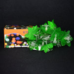 Festive multi-color Leaf & Flower LED Decorative String Light illuminating a home wall