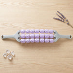 Massage stick used for post workout muscle recovery