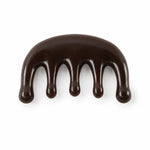 A dark brown resin scalp massager with five rounded prongs is centered on a plain white background.