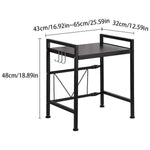 Black metal microwave oven rack with dimensions displayed in centimeters and inches on a white background.