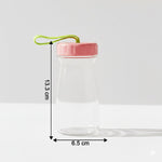 Close-up view of glass bottle topped with leak-proof silicone lid