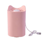 A pink cat-eared mosquito lamp with a white USB cable is shown on a plain white background.