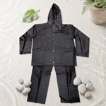 Hooded rain jacket and pant set for enhanced safety on bikes and scooters.