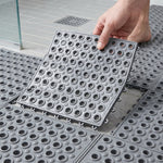 Interlocking bathroom safety mats in black for wet areas