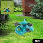 Connecting a garden hose to the 3-arm water sprinkler for easy setup.