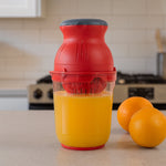 Top view of manual juicer and corn cutter kitchen tool