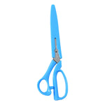 Carbo Titanium fabric scissors making a precise cut through tough denim material.