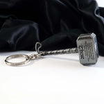Close-up of hammer handles and metal alloy keychain detail