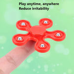 Toothbrush and spinner toy set encouraging children's oral hygiene