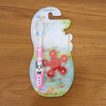 Fun and interactive kids toothbrush set with panda theme and spinner toy