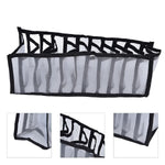 A white and black mesh fabric organizer is shown unfolded, with three close-up insets highlighting its construction details.