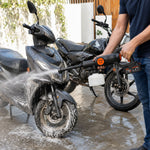 Car washer spraying a high pressure jet