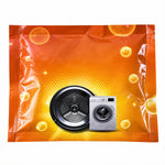 An orange powder sachet with a washing machine drum and miniature washing machine graphic on a white background.