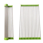 Stainless steel kitchen sink drain rack, extended over a sink for drying dishes.