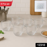 Close-up of ergonomic handle on transparent plastic tea cup