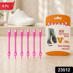 Six pink silicone no-tie shoelaces with white accents, next to their orange and white packaging. A white shoe is – view 2