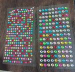 Display of multi-size self adhesive crystals for diverse art and craft projects.