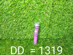 A clear tube with a silver cap and a purple label containing purple paper soap strips stands upright on a green artificial