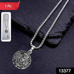 Round silver Hanuman pendant necklace on a plain background.