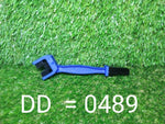 Motorbike chain cleaner tool displayed from various angles, showcasing its design.