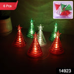 Mini battery operated LED Christmas tree lights in cone shape with glowing star tops