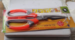 Multi-function kitchen scissors displayed with their packaging, ready for use in an Indian kitchen.