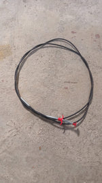 The effective drain cleaner tool with its spring and claw, designed for easy clog removal.