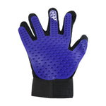 A person using the flexible deshedding glove to comfort and groom their cat.