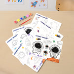 Box packed kids painting kit with cosmic space drawings and painting supplies