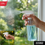 A hand holds a clear spray bottle with blue liquid, spraying water onto a windowpane, with an inset of the sprayer.