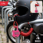 A black motorcycle helmet is secured to a bike rack with a pink combination lock and red coiled cable, with a "1 Pc" label.