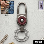 Close-up of metal key holder with sleek modern finish and secure locking carabiner