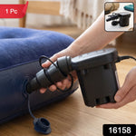 Close-up of a black electric air pump with three nozzles, inflating a blue air mattress, with hands holding it.