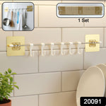 Close-up of the stainless steel horizontal hook hanging rod for kitchen utensils